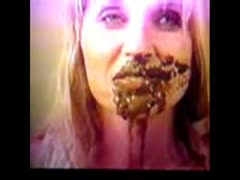 Blonde MILF enjoying a hot poop inside her mouth